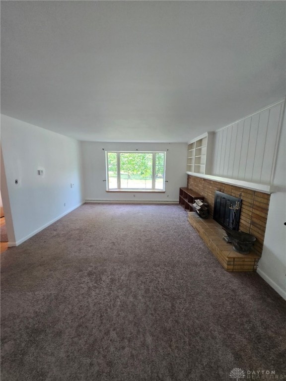 1095 Susan Dr, Hamilton, OH 45013 - unfurnished living room featuring a brick fireplace and carpet