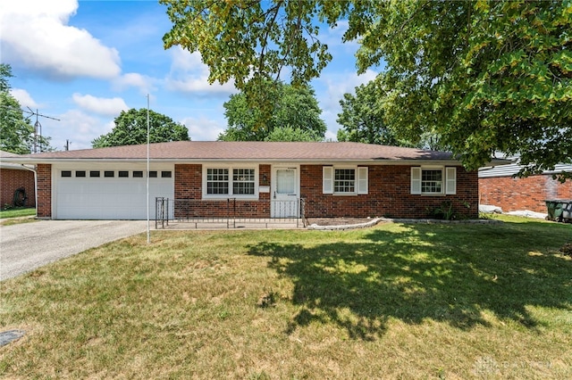 1021 Nutmeg Sq, Troy, OH 45373 - ranch-style house with driveway, a garage, a front yard, and brick siding