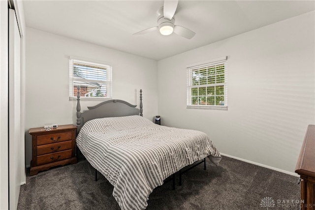 1021 Nutmeg Sq, Troy, OH 45373 - carpeted bedroom featuring multiple windows and ceiling fan