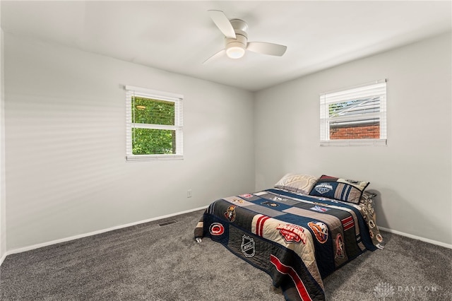 1021 Nutmeg Sq, Troy, OH 45373 - bedroom with multiple windows, carpet, and ceiling fan