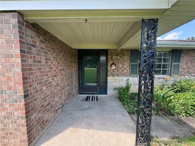 2886 Kemp Rd, Beavercreek, OH 45431 - view of exterior entry with brick siding