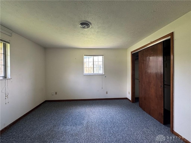 2886 Kemp Rd, Beavercreek, OH 45431 - unfurnished bedroom with carpet flooring and a textured ceiling