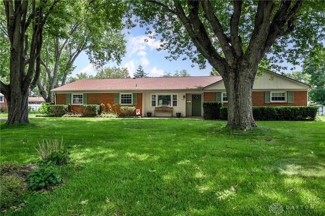 174 Tuxworth Rd, Dayton, OH 45458 - ranch-style home featuring brick siding and a front lawn