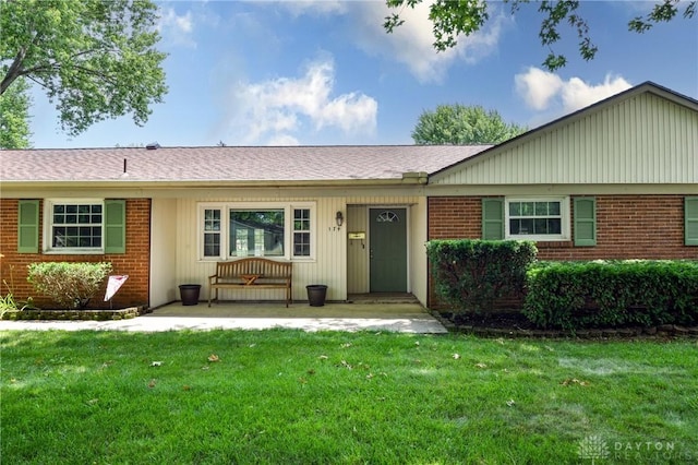 174 Tuxworth Rd, Dayton, OH 45458 - ranch-style home with brick siding and a front yard