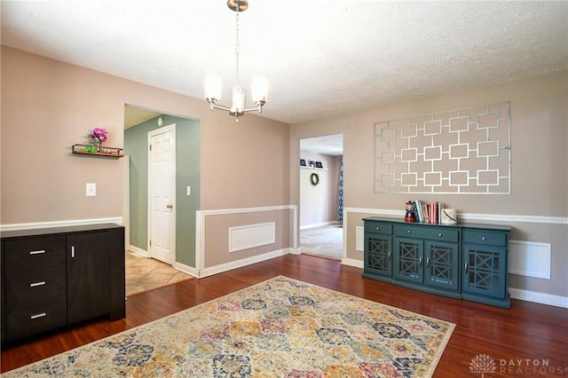 174 Tuxworth Rd, Dayton, OH 45458 - dining room featuring wood finished floors and a chandelier