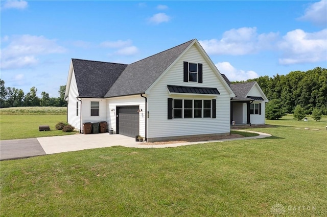9782 E US Highway 22 And 3, Clarksville, OH 45113 - view of front facade featuring driveway, a front lawn, an attached garage, and roof with shingles