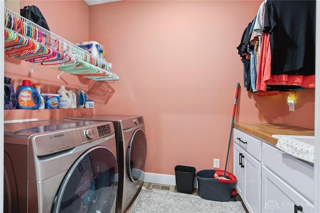 9782 E US Highway 22 And 3, Clarksville, OH 45113 - laundry room with washing machine and clothes dryer and cabinet space