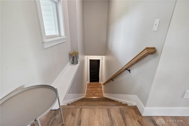 9782 E US Highway 22 And 3, Clarksville, OH 45113 - staircase with wood finished floors and baseboards
