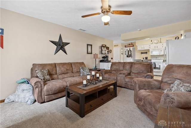 222 Alumni Cir, Wilmington, OH 45177 - living area featuring light colored carpet and ceiling fan