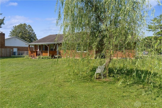 222 Alumni Cir, Wilmington, OH 45177 - view of yard featuring covered porch