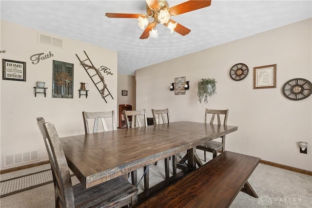 222 Alumni Cir, Wilmington, OH 45177 - carpeted dining room with ceiling fan and baseboards