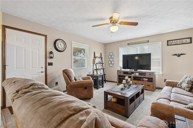 222 Alumni Cir, Wilmington, OH 45177 - living area featuring light colored carpet, ceiling fan, and a textured ceiling