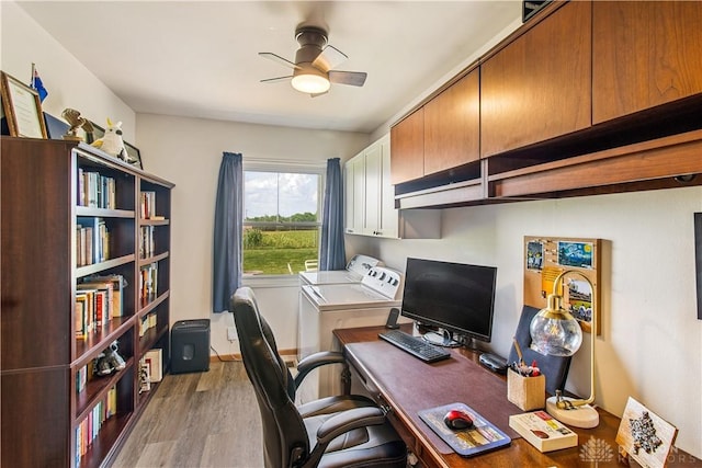 984 Emmett Dr, Xenia, OH 45385 - office area with wood finished floors, a ceiling fan, and separate washer and dryer
