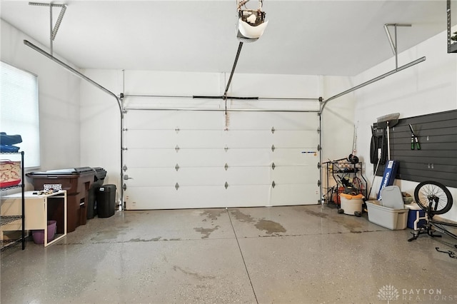 1471 Runnymeade Way, Beavercreek Twp, OH 45385 - garage featuring a garage door opener
