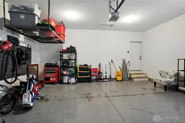 1471 Runnymeade Way, Beavercreek Twp, OH 45385 - garage featuring a garage door opener