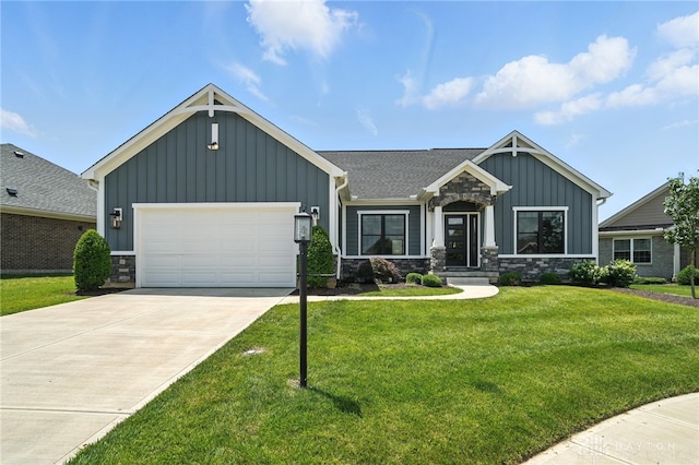 1471 Runnymeade Way, Beavercreek Twp, OH 45385 - view of front of property featuring board and batten siding, stone siding, an attached garage, and concrete driveway