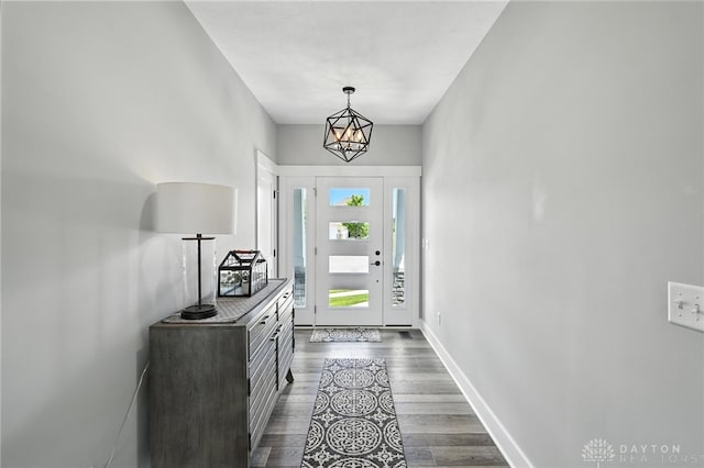 1471 Runnymeade Way, Beavercreek Twp, OH 45385 - entryway featuring dark wood finished floors and baseboards