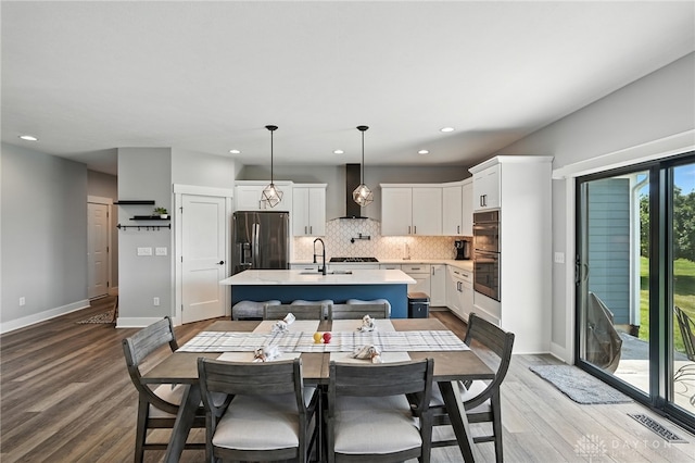 1471 Runnymeade Way, Beavercreek Twp, OH 45385 - dining area featuring recessed lighting and wood finished floors