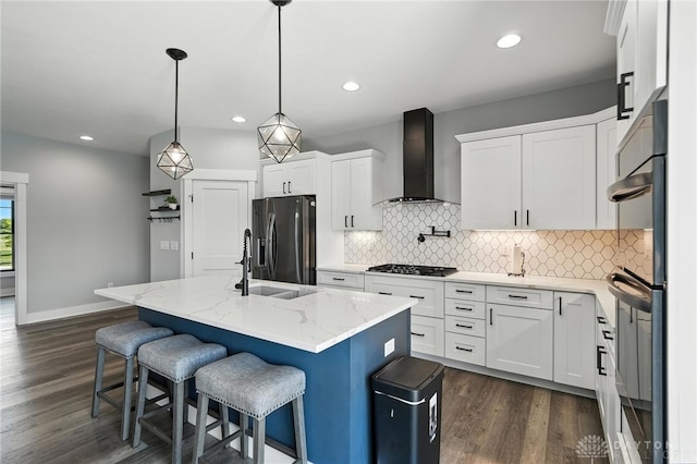 1471 Runnymeade Way, Beavercreek Twp, OH 45385 - kitchen featuring appliances with stainless steel finishes, wall chimney range hood, dark wood-style flooring, backsplash, and recessed lighting