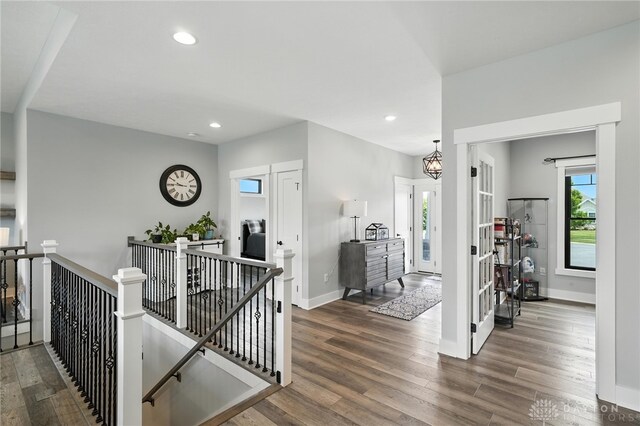 1471 Runnymeade Way, Beavercreek Twp, OH 45385 - hall featuring an upstairs landing, wood finished floors, recessed lighting, and a chandelier