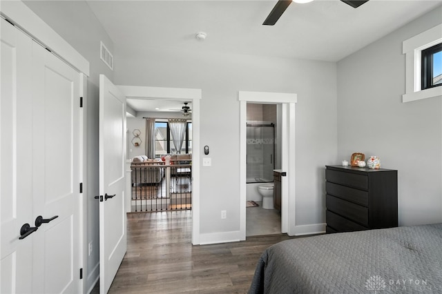 1471 Runnymeade Way, Beavercreek Twp, OH 45385 - bedroom featuring wood finished floors, multiple windows, ensuite bath, and a closet