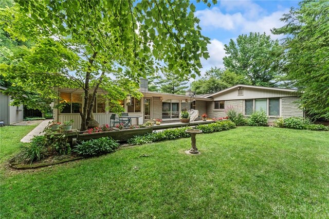 347 Winding Trl, Xenia, OH 45385 - view of front of property with a front yard and a chimney