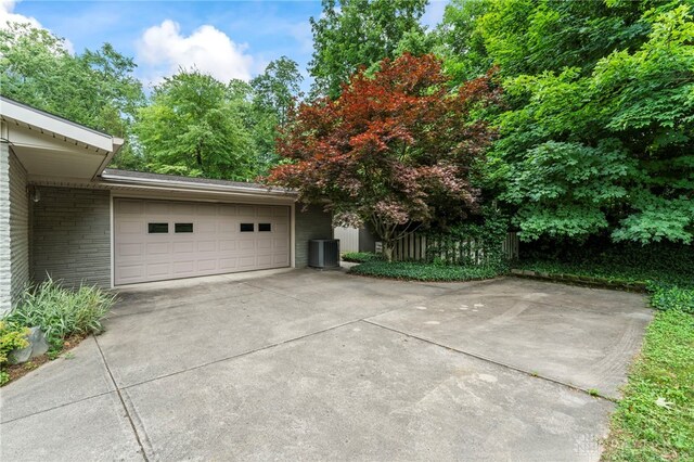 347 Winding Trl, Xenia, OH 45385 - view of side of property featuring a cooling unit and brick siding