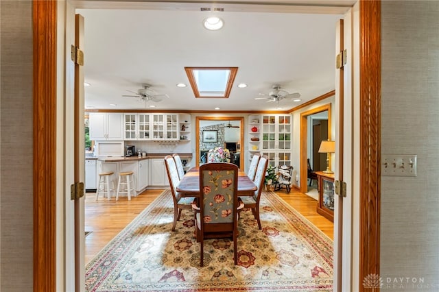 347 Winding Trl, Xenia, OH 45385 - dining area with light wood-style flooring, recessed lighting, ceiling fan, and ornamental molding