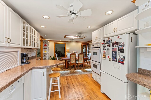 347 Winding Trl, Xenia, OH 45385 - kitchen featuring white appliances, recessed lighting, light wood-style flooring, a ceiling fan, and white cabinets