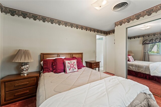 347 Winding Trl, Xenia, OH 45385 - carpeted bedroom featuring a closet