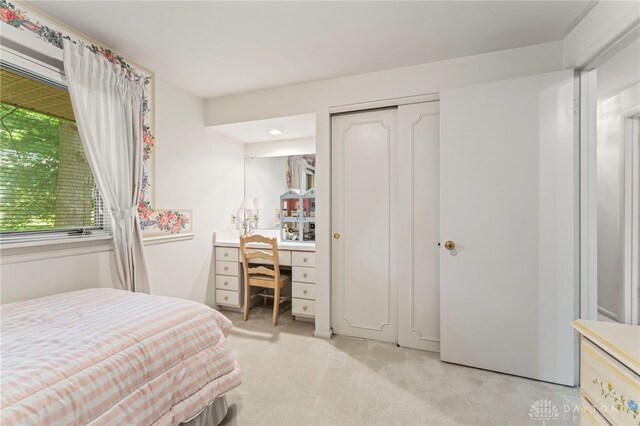 347 Winding Trl, Xenia, OH 45385 - bedroom featuring light colored carpet, an office area, a closet, and recessed lighting