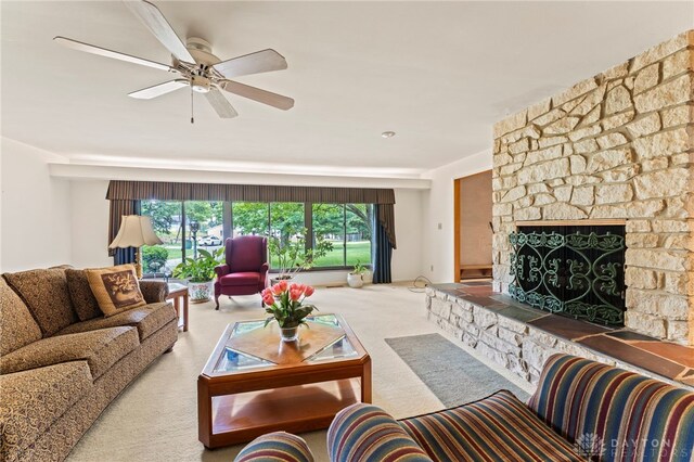 347 Winding Trl, Xenia, OH 45385 - carpeted living room with a ceiling fan and a fireplace