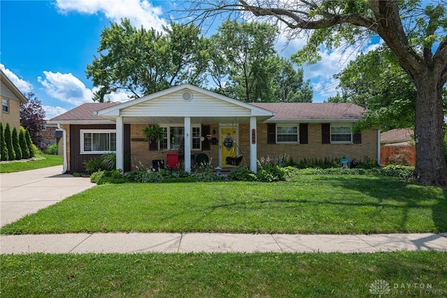 1808 Burnside Dr, Miamisburg, OH 45342 - ranch-style home featuring a front yard, a porch, and brick siding