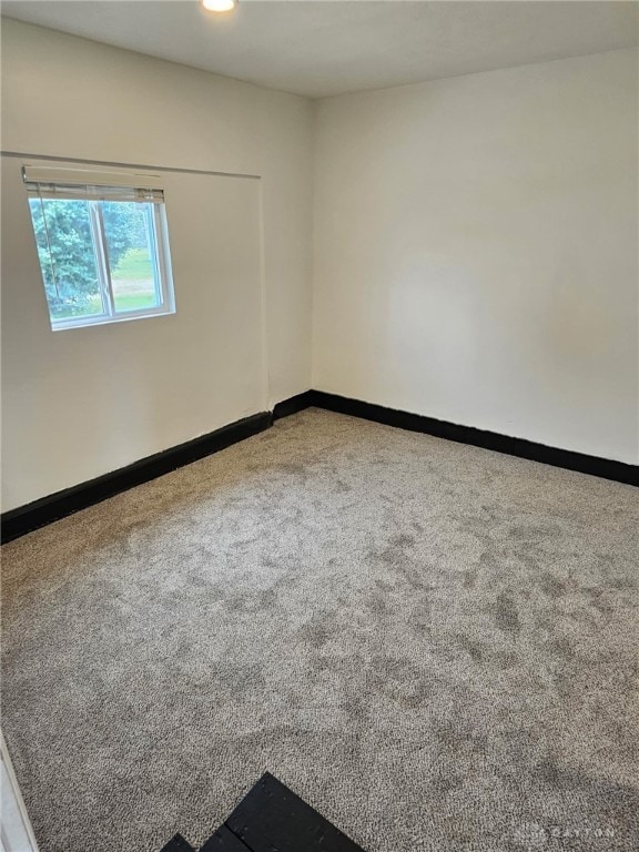 283 Moore St, Lewisburg, OH 45338 - unfurnished room with carpet floors and baseboards