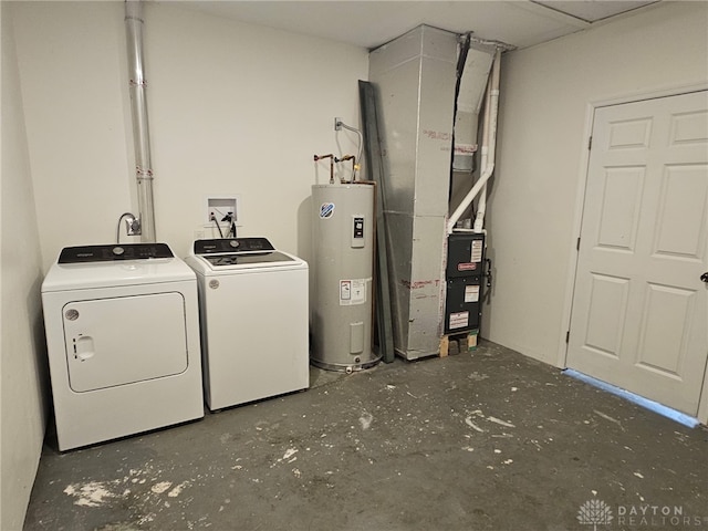 283 Moore St, Lewisburg, OH 45338 - laundry room featuring water heater and washing machine and dryer