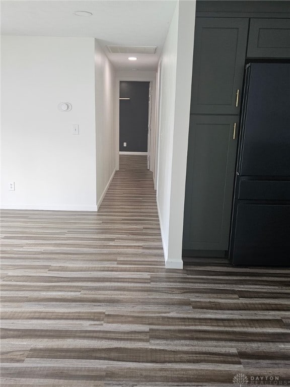 283 Moore St, Lewisburg, OH 45338 - corridor featuring wood finished floors and baseboards