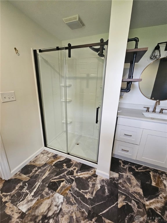 283 Moore St, Lewisburg, OH 45338 - full bath featuring a stall shower, vanity, and marble finish flooring