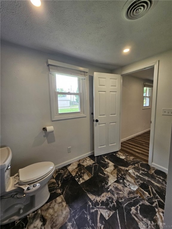 283 Moore St, Lewisburg, OH 45338 - bathroom featuring a textured ceiling and recessed lighting