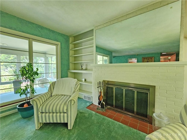851 E County Line Rd, Springfield, OH 45502 - living area featuring a fireplace, carpet floors, and built in features
