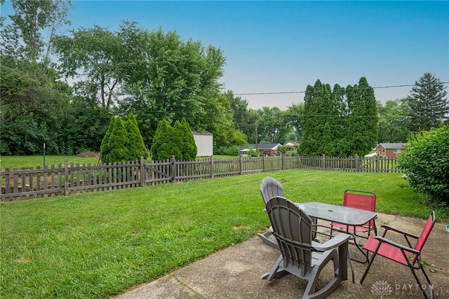 3442 Longleaf Ave, Beavercreek, OH 45430 - fenced backyard with outdoor dining space, a patio, and view of wooded area