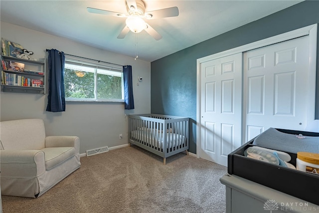 3442 Longleaf Ave, Beavercreek, OH 45430 - carpeted bedroom featuring a closet, a crib, and a ceiling fan