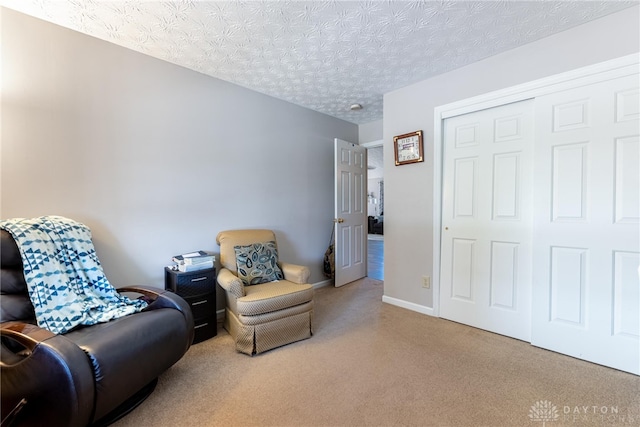 488 Jodee Dr, Xenia, OH 45385 - living area with carpet and a textured ceiling