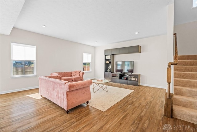 1835 Winding Run, Clearcreek Twp, OH 45458 - living room with stairs, wood finished floors, and recessed lighting