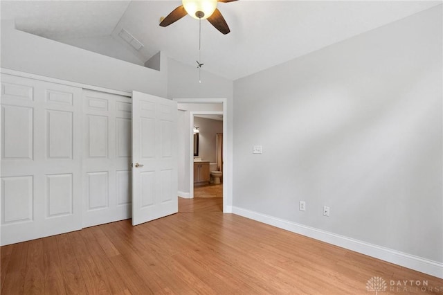 2782 Stefan Pl, Beavercreek, OH 45431 - unfurnished bedroom with vaulted ceiling, light wood-type flooring, a closet, and a ceiling fan