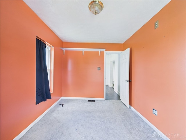 491 Frazers Rd, West Manchester, OH 45382 - empty room featuring carpet flooring and baseboards