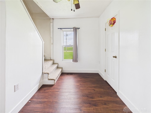 491 Frazers Rd, West Manchester, OH 45382 - unfurnished room with stairs, ceiling fan, and wood finished floors