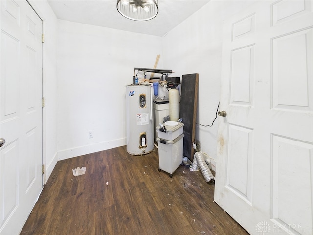 491 Frazers Rd, West Manchester, OH 45382 - misc room featuring water heater and wood finished floors