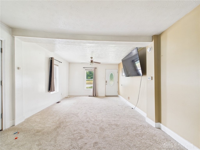 491 Frazers Rd, West Manchester, OH 45382 - empty room with carpet, ceiling fan, and a textured ceiling
