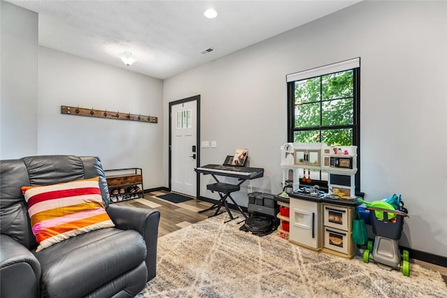 1950 Stone Creek Blvd, Clearcreek Twp, OH 45458 - living room featuring wood finished floors and baseboards