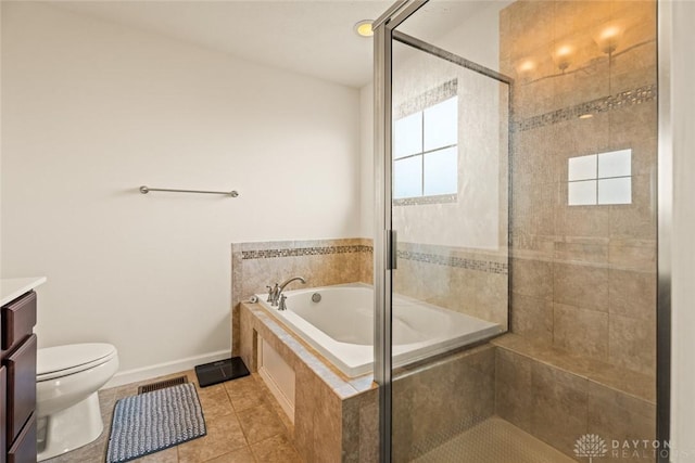 1950 Stone Creek Blvd, Clearcreek Twp, OH 45458 - bathroom with a garden tub, vanity, tiled shower, and tile patterned flooring